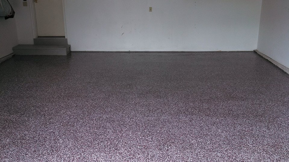 Red and gray flake epoxy garage floor by Expert Concrete Care