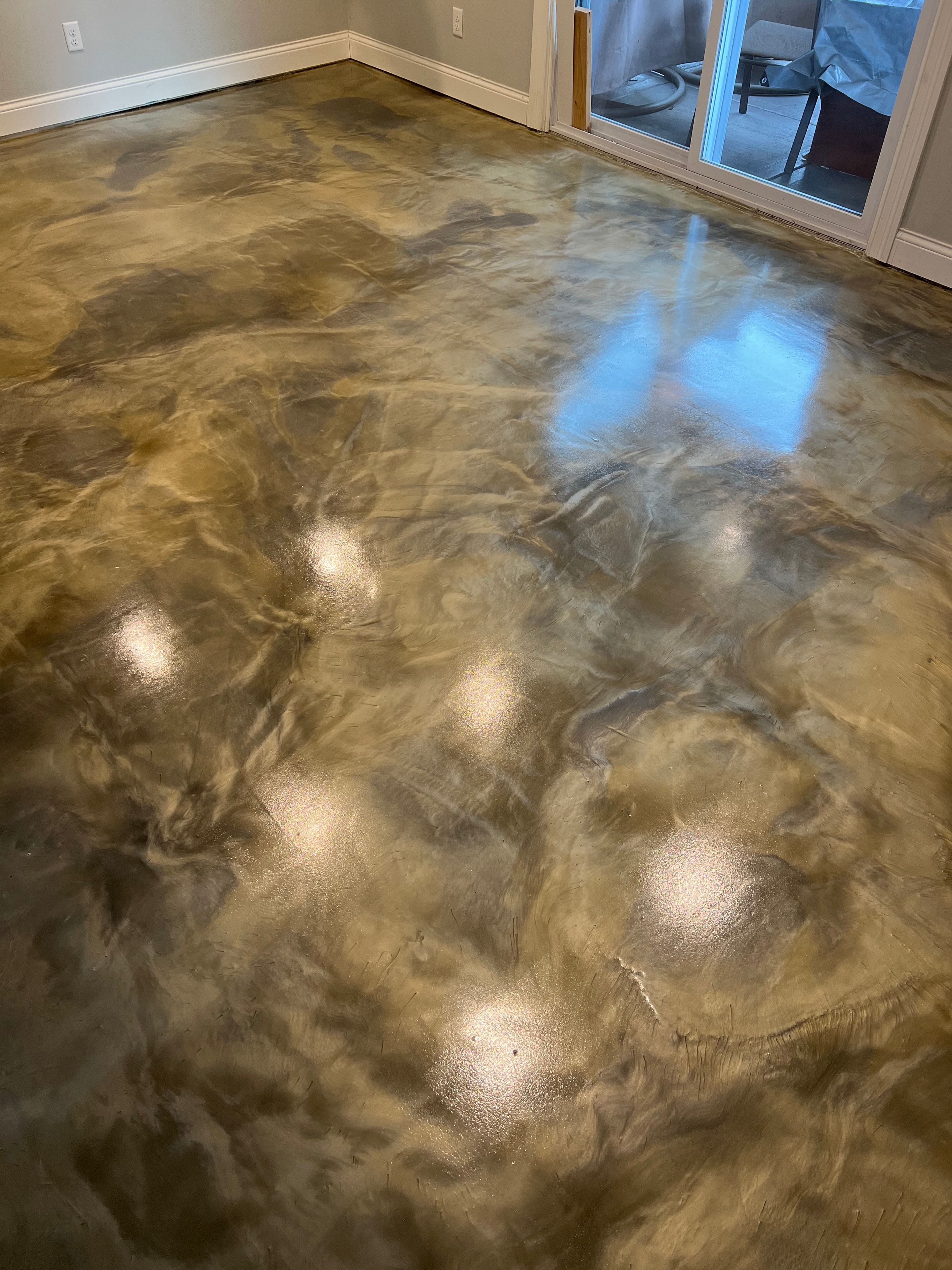 Metallic epoxy floor close-up swirl detail
